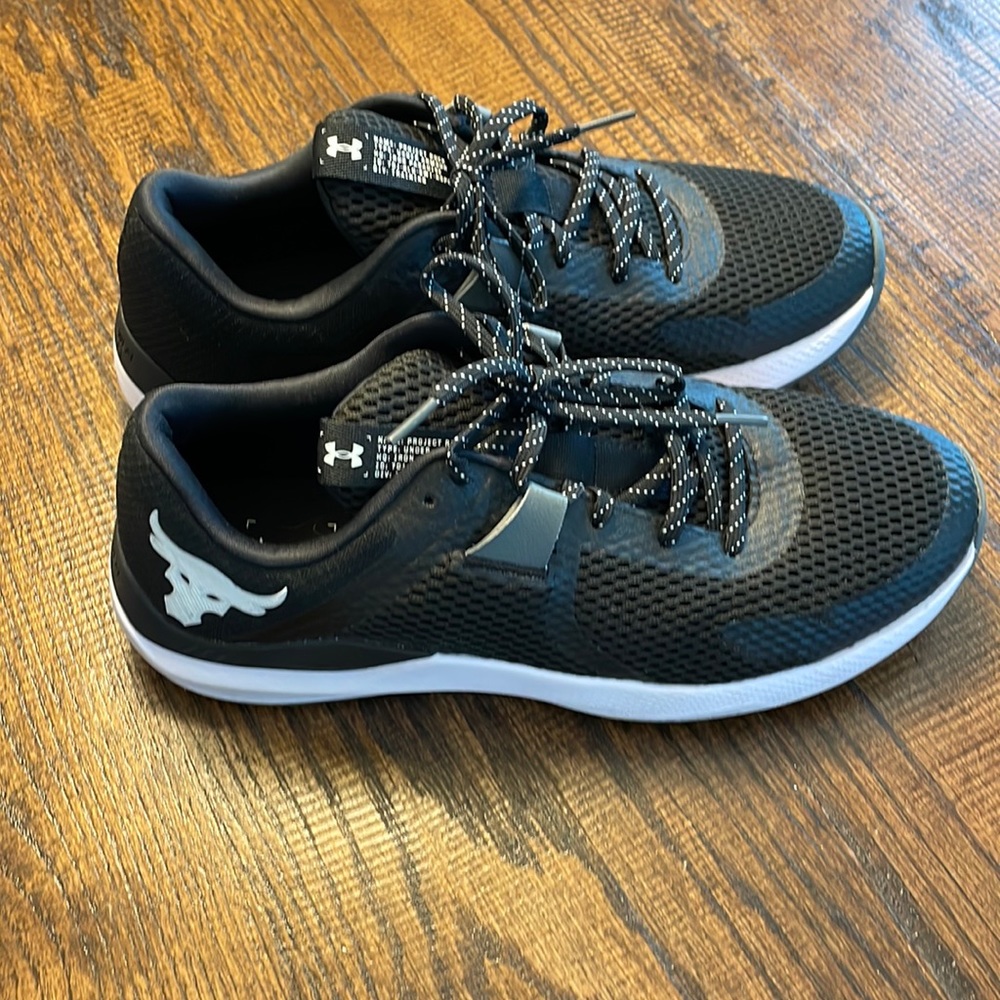 Under Armor Shoes size 11 men’s. Project Rock shoes been worn one time